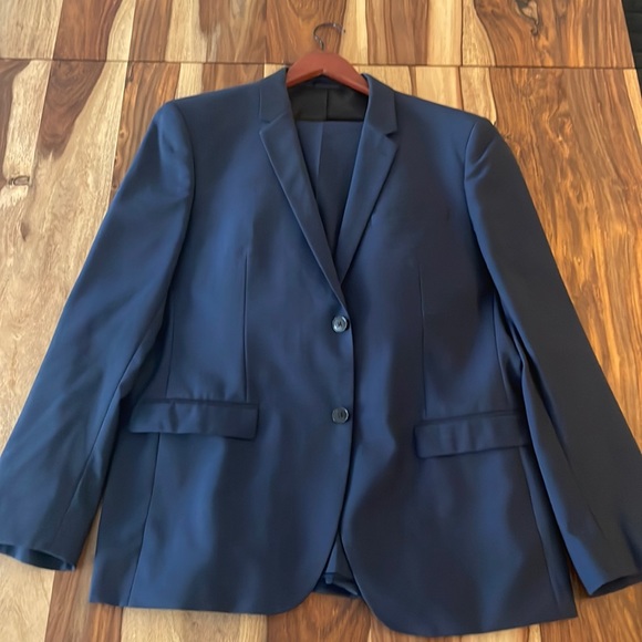 Navy blue suit (pants and coat). - Picture 1 of 3